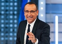 Covid, Carlo Conti in ospedale