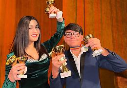 Karola e Andrea Fichera, giovani talenti di Aci Catena, trionfano al festival vocale in Romania